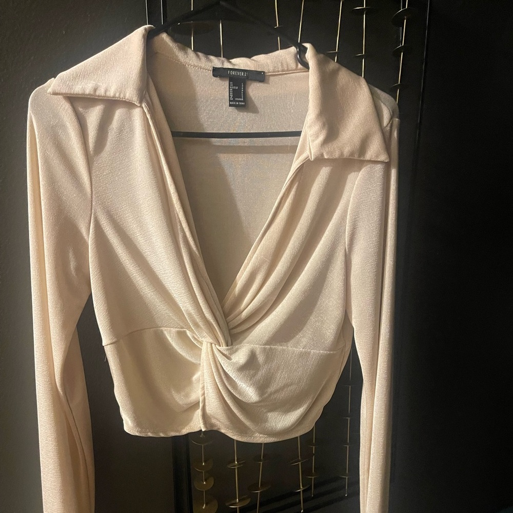 Cream cropped blouse.